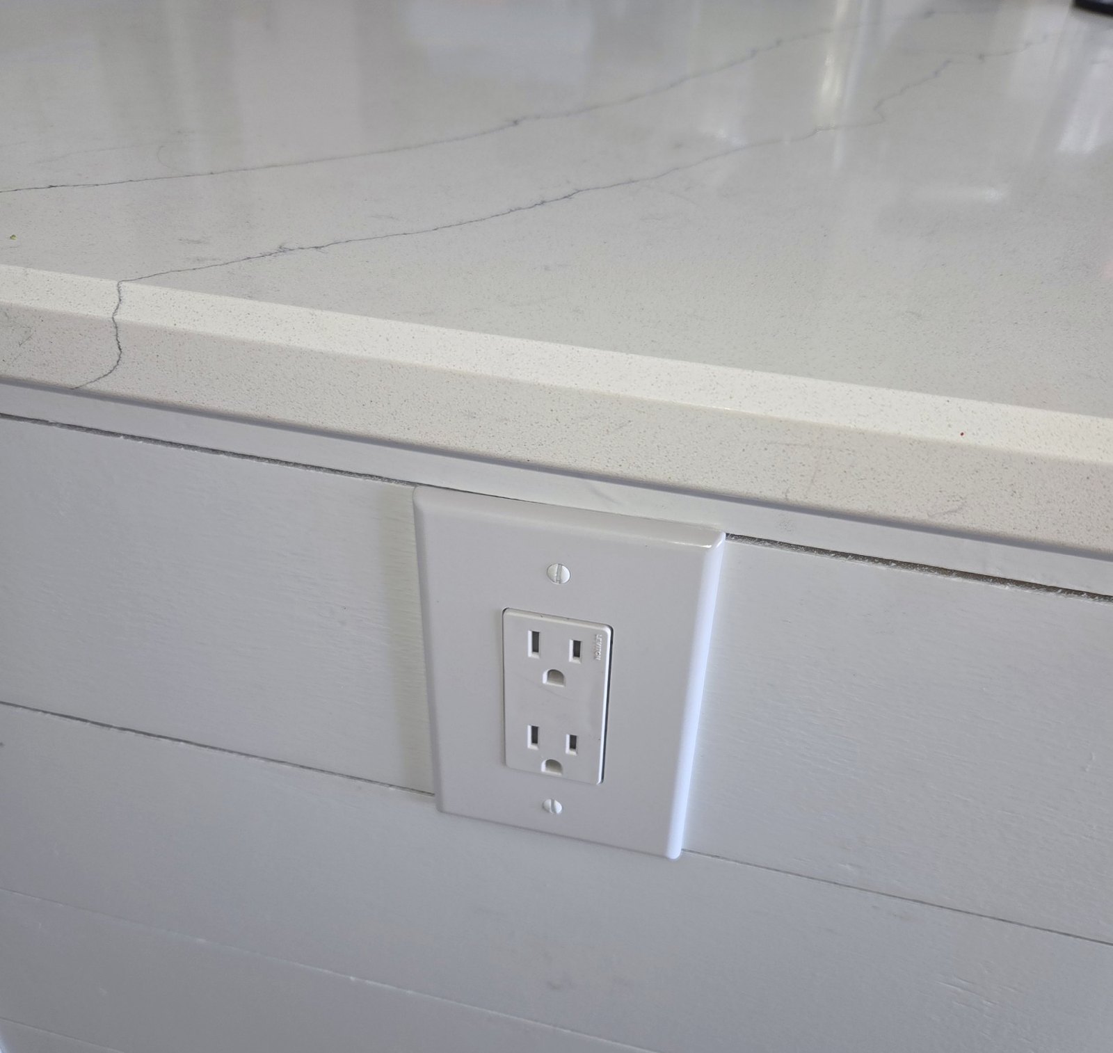 Receptacle installed in a kitchen island end panel